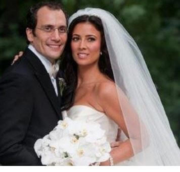 Andrew Sansone with his wife Julie Banderas on their wedding day